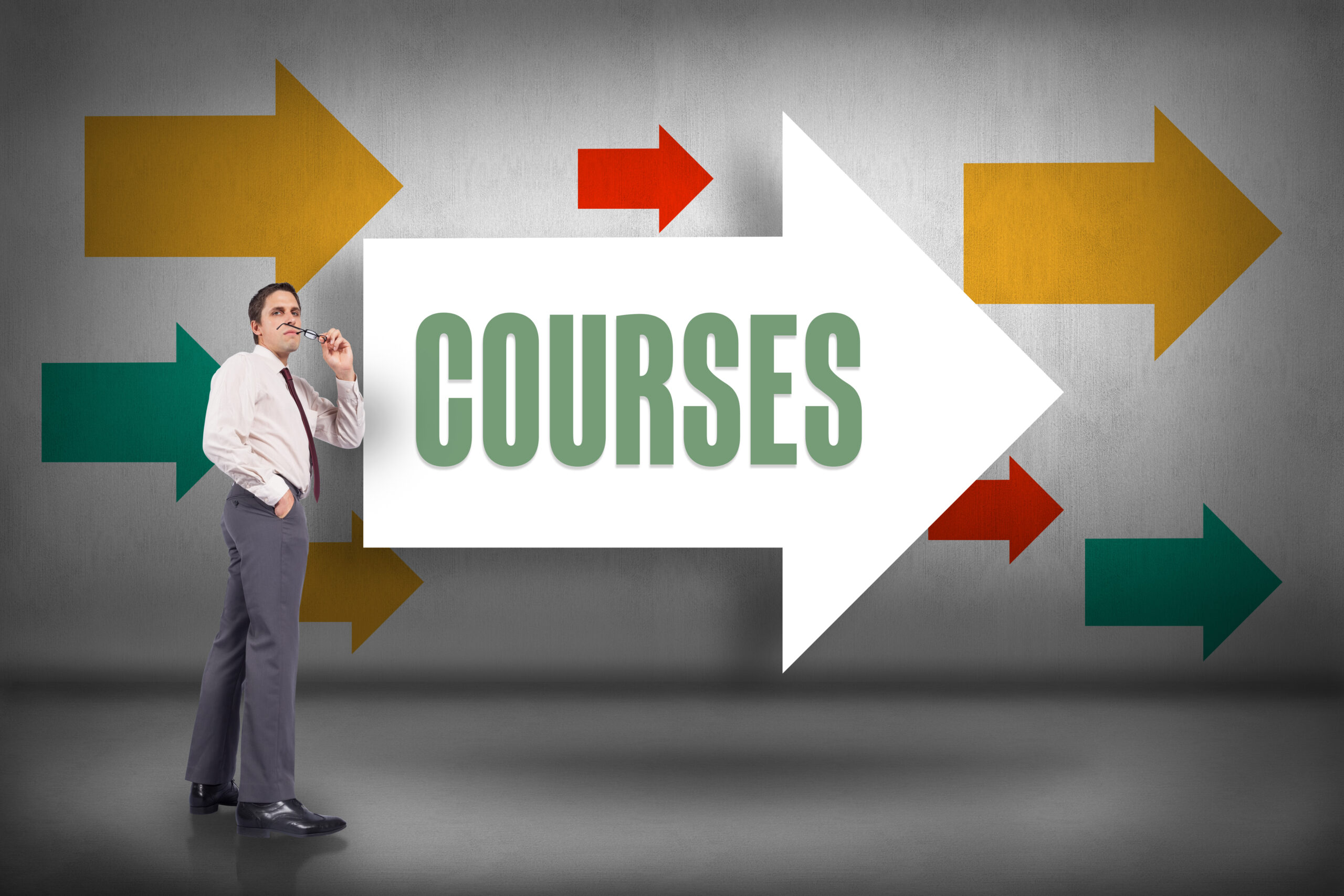 The word courses and thinking businessman holding glasses against arrows pointing